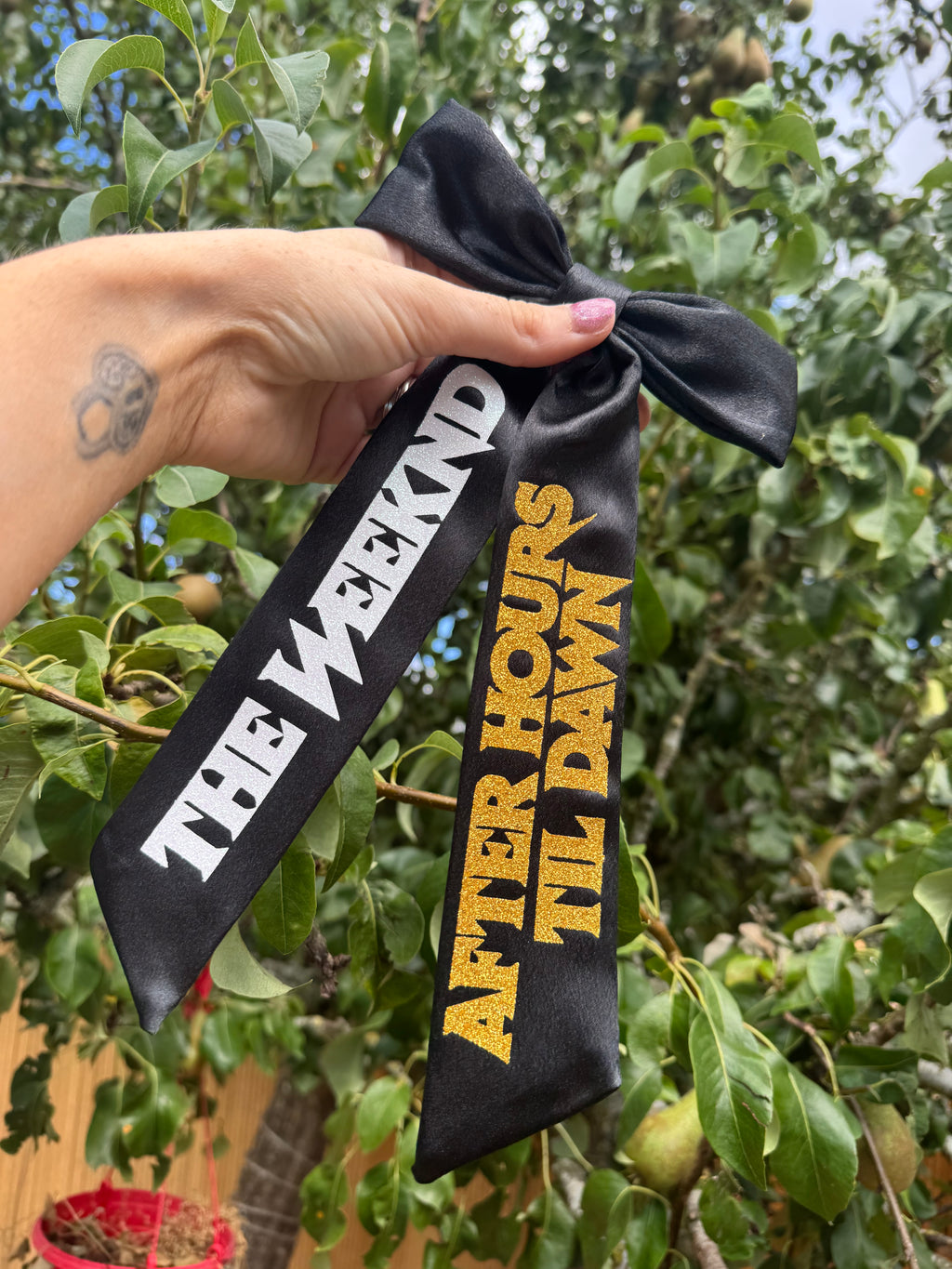 Inspired by The Weeknd logo design bow