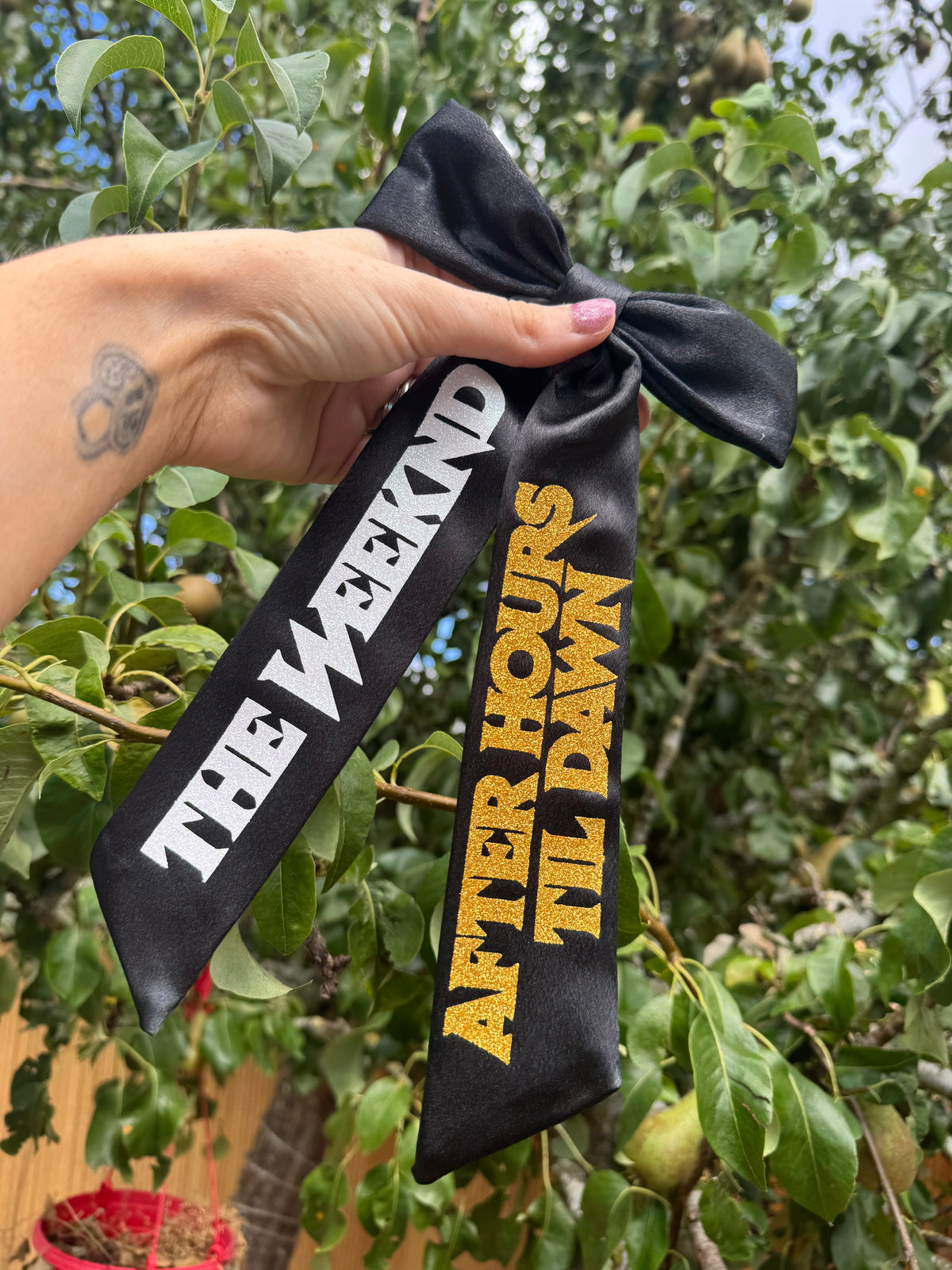 Inspired by The Weeknd logo design bow