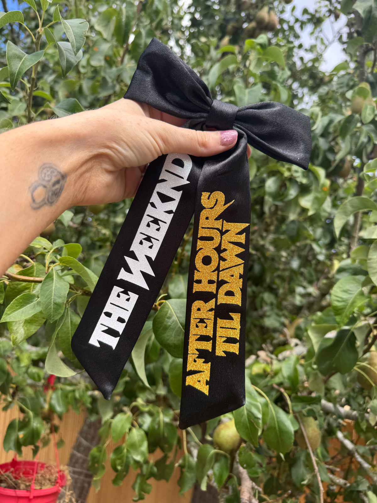 Inspired by The Weeknd logo design bow