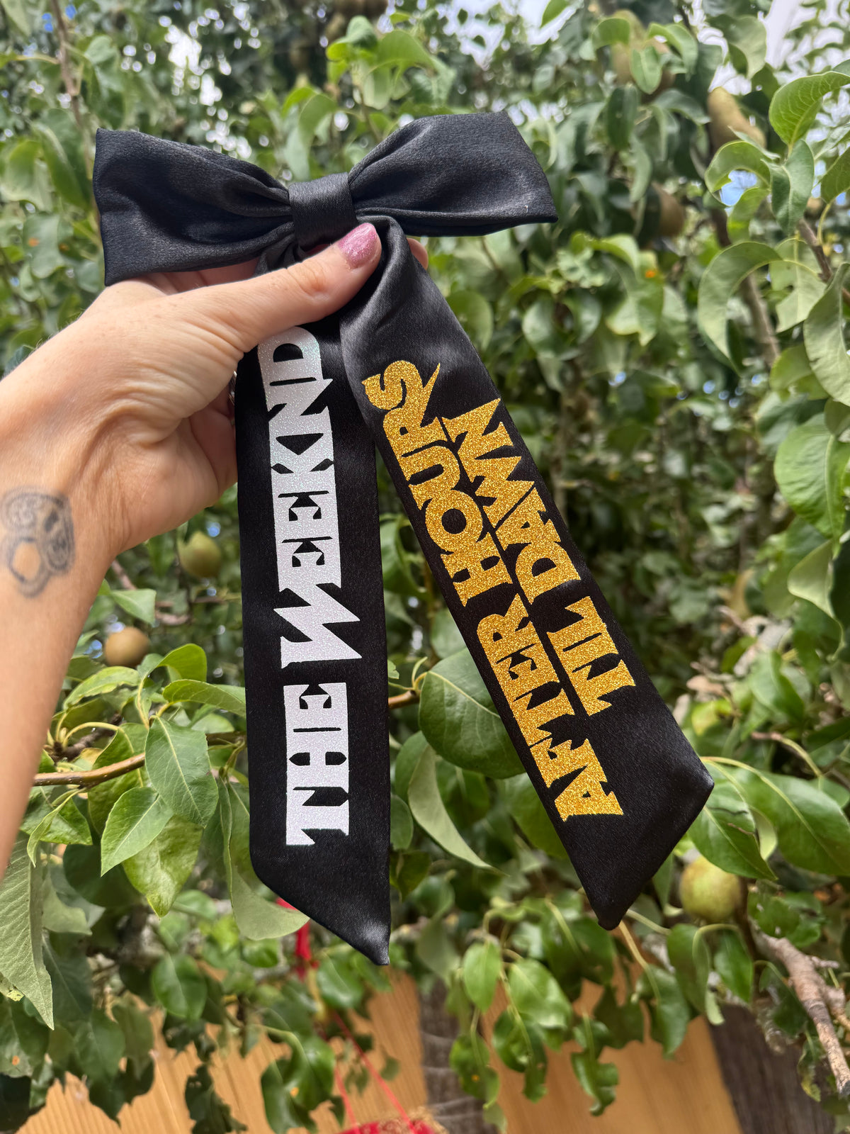 Inspired by The Weeknd logo design bow