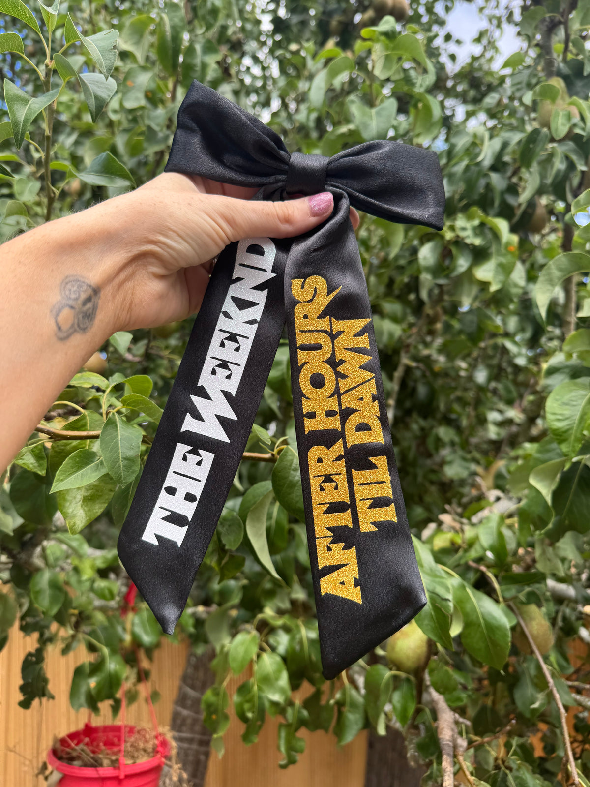 Inspired by The Weeknd logo design bow