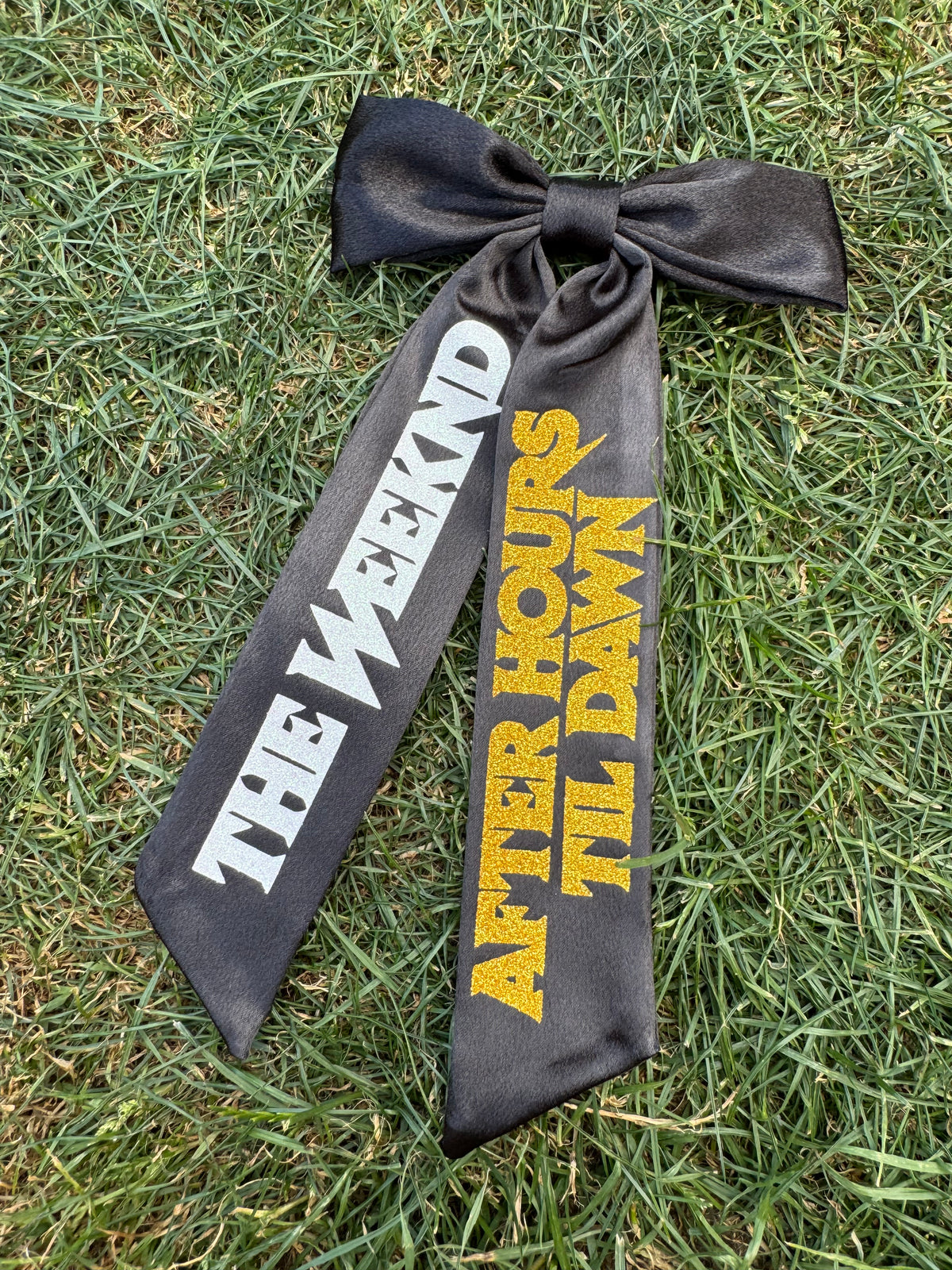 Inspired by The Weeknd logo design bow